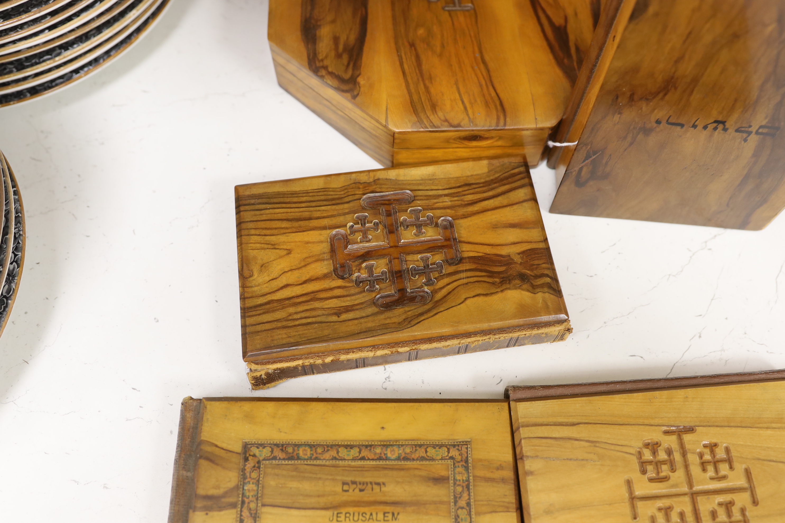 A collection of Jerusalem ware olive wood boxes, two albums, two books, etc.